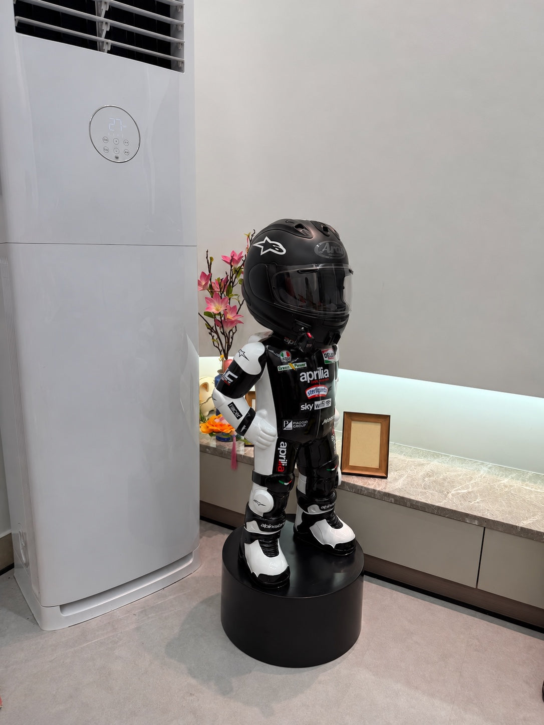 Black Aprilia Style MotoMan helmet display stand