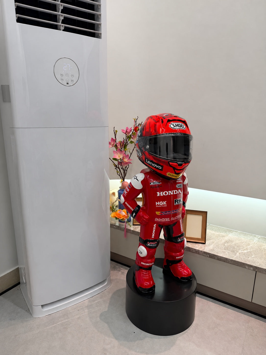 Red Honda Style MotoMan helmet display stand
