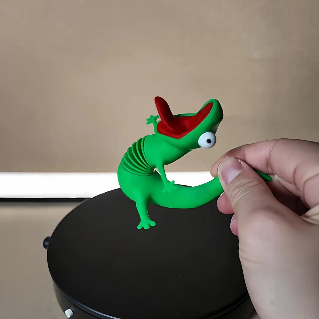 Green 3D-printed springy lizard desk and car ornament