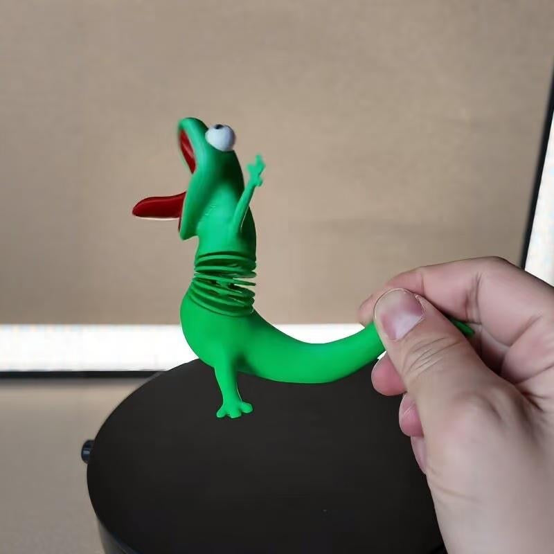 Green 3D-printed springy lizard desk and car ornament